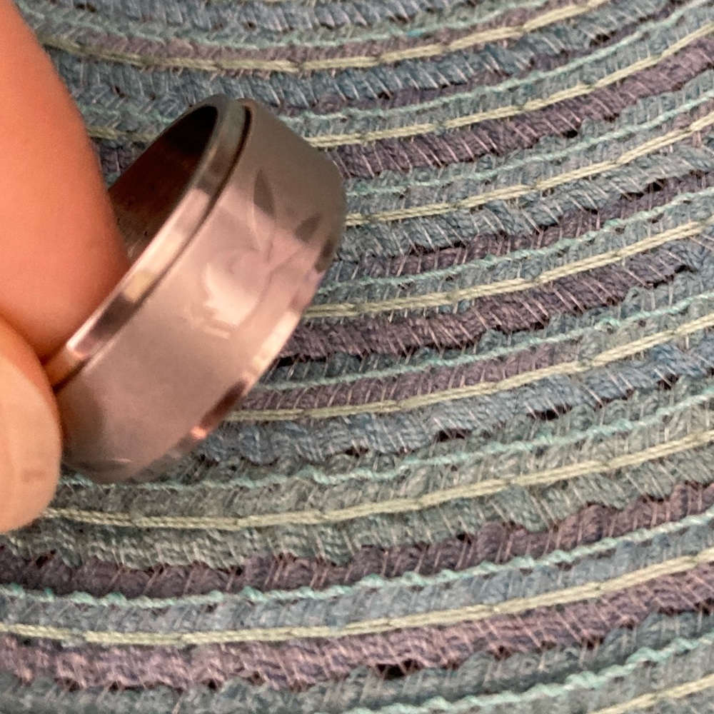 Playboy bunny spinner ring band stainless steel. Size 6.24-6.5